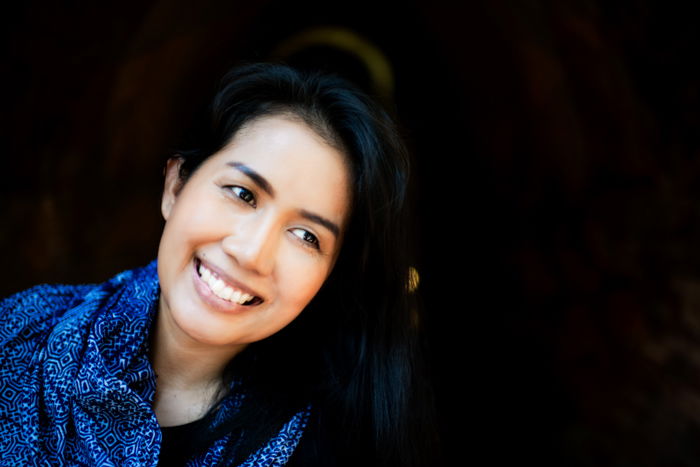 Portrait of an asian woman with dark background