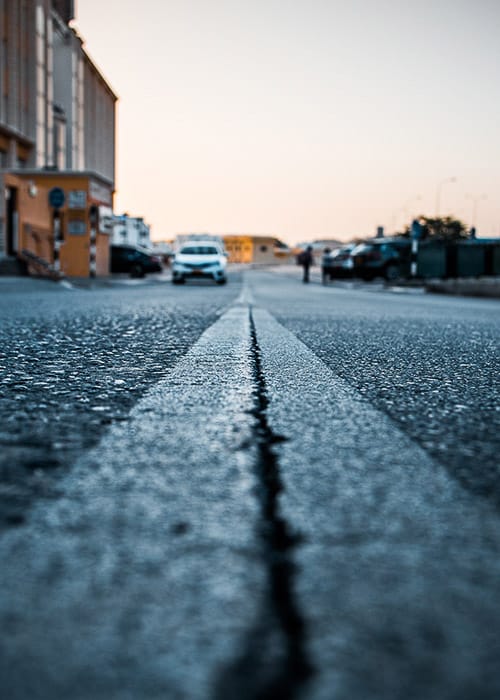 A low angle street photo taken from the centre of the road - using aspect ratio in photography