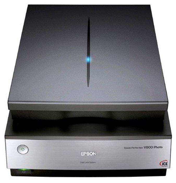 An epson photo scanner used to digitize photos on white background