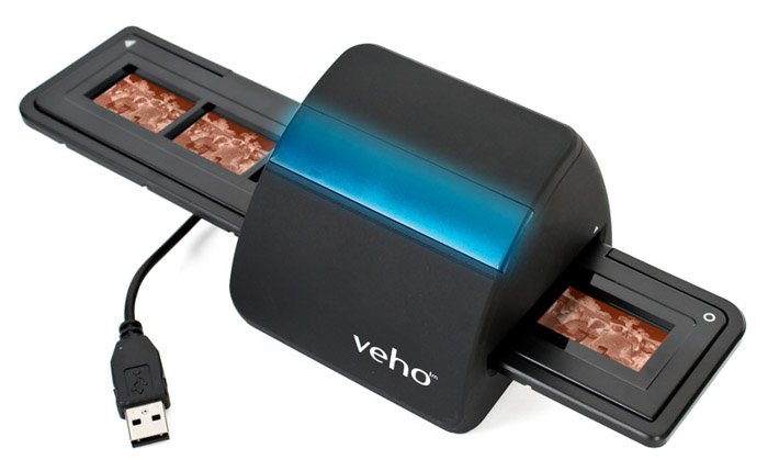 An Veho negative scanner used to digitize photos on white background