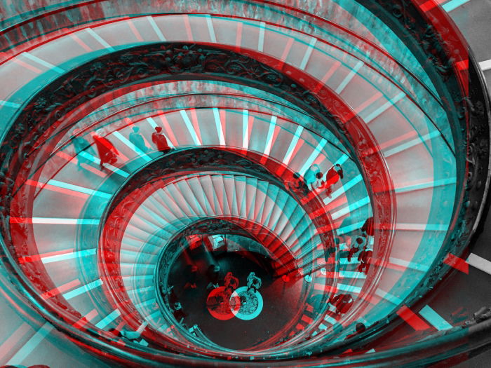 A spiral staircase edited with a glitch art effect 