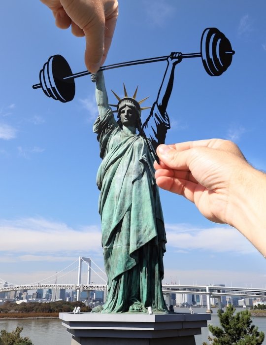 Creative forced perspective example using the statue of Liberty
