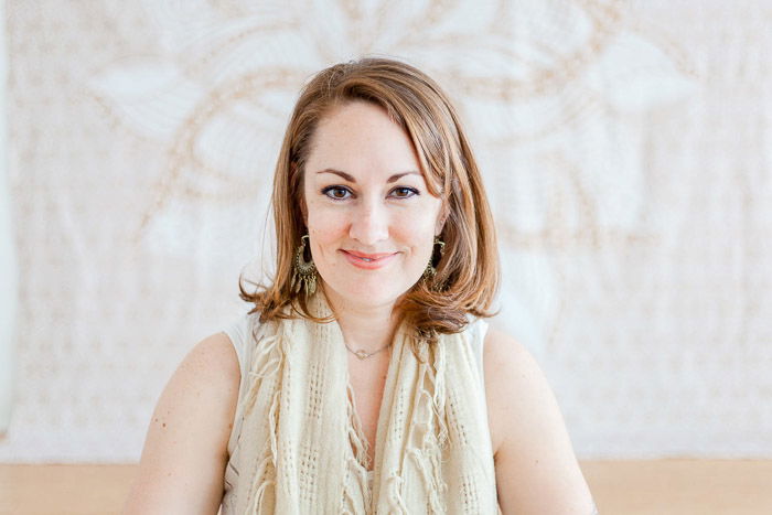 Bright and airy photo of a woman which was not cropped during portrait editing.