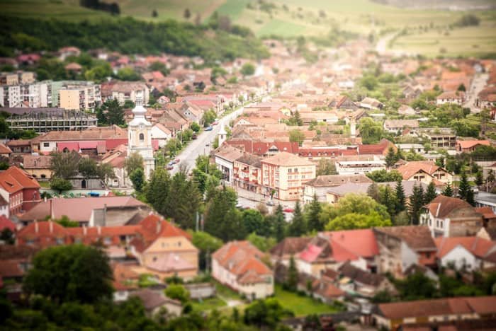 Overhead shot of a sprawling cityscape using tilt-shift photography