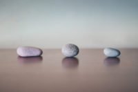 photo of three stones placed in a line
