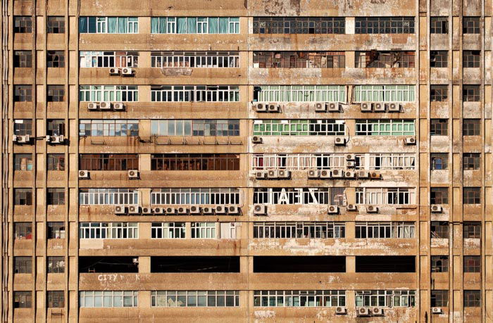 The exterior of a run down industrial building or apartment block 