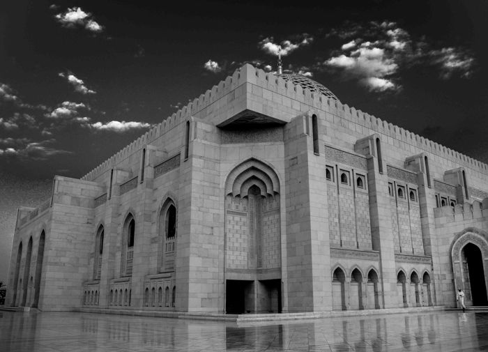 A black and white shot of the exterior of a beautiful building. Use of scale in Architecture Photography composition