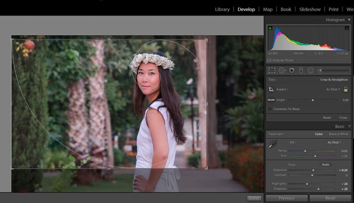 using the golden ratio while cropping a photo of a woman in a white dress wearing a flower crown in lightroom