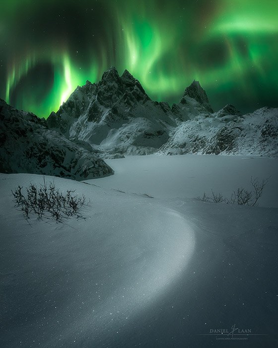The northern lights dancing above a remote area in the Lofoten. 
