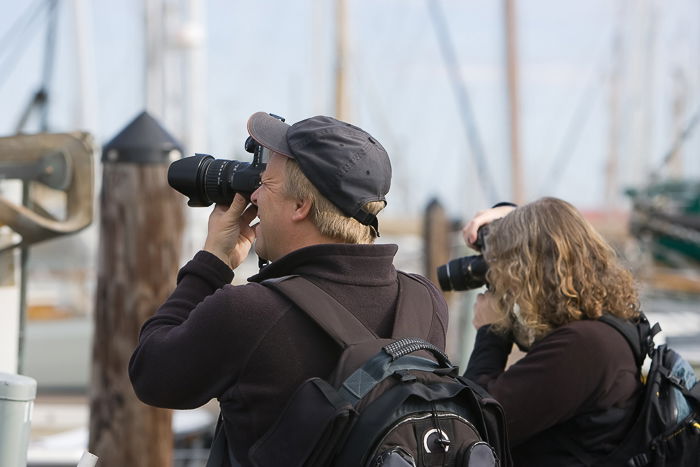 Two photographers working outdoors