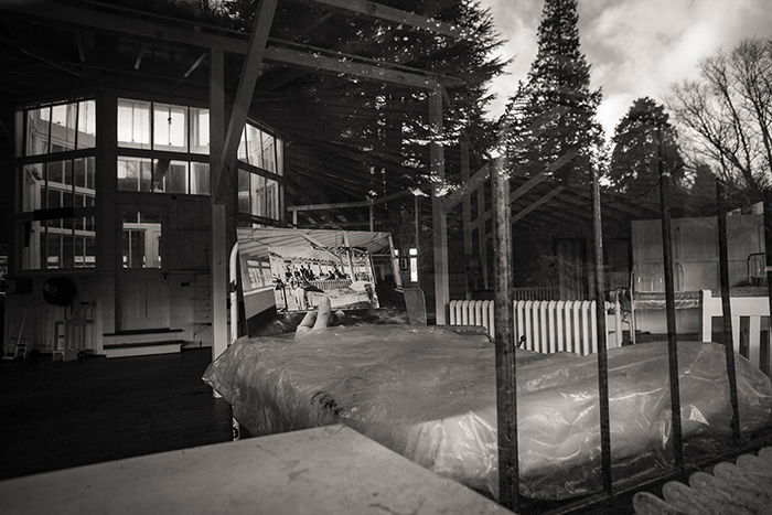 black and white photo of an old bed at Queen Mary Hospital in Hanmer, New Zealand.