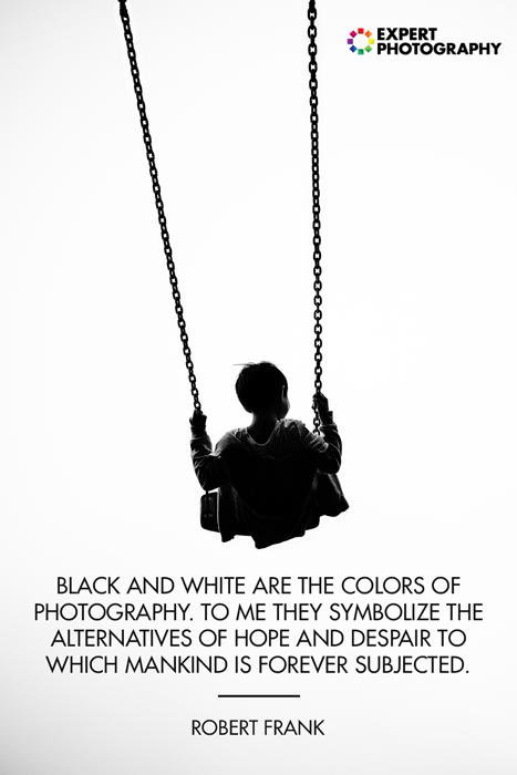 A photo of the silhouette of a little boy on a swingset overlayed with a black and white photography quote from Robert Frank