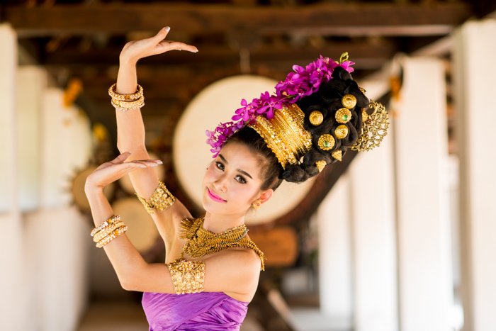 Portrait of a beautiful Thai dancer in the center of the frame