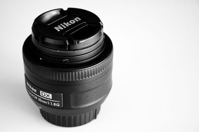 A nikon lens on a white background