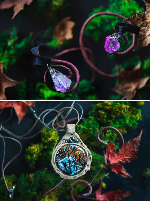 close up of nature inspired pendants, green moss and leaves in the background