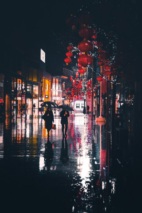 Atmospheric picture of the rain on a city street at night