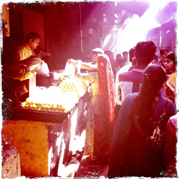 Atmospheric street photography of a crowded market in India taken using the hipstamatic app.