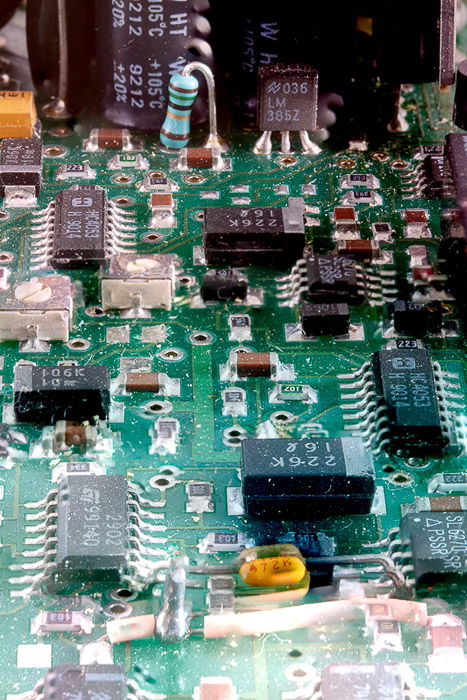 A very poor result of focus stacking a macro shot of a circuit board, the result of forgetting to align images before blending.