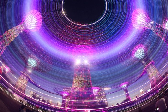 A light painting photo of supertrees in Singapore 