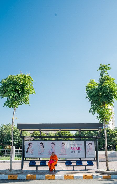 Bright and airy outdoor photo of a bus stop using natural light photography