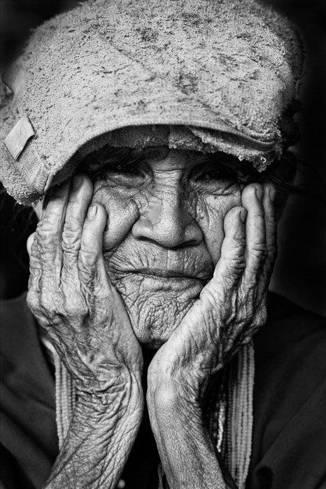 A black and white portrait of an Old Karen Woman