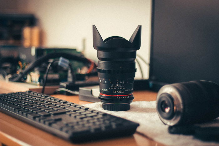 A zoom lens on a photographers desk