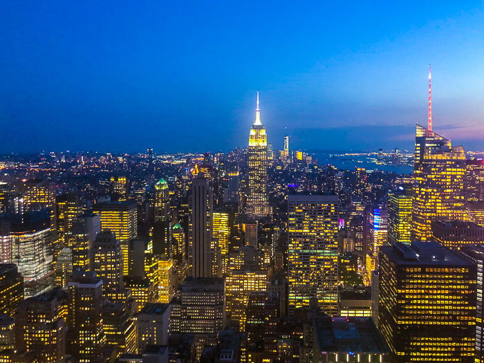 An aerial view of a stunning cityscape at night - photography prices for beginners 