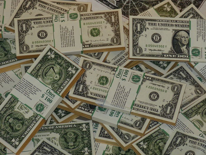 photo of a large stack of dollars