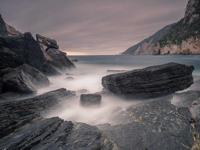 Stunning Long Exposure shot of a rocky coastal seascape in Porto Venere