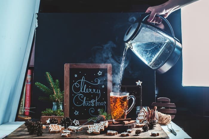 A christmas still life photography shot of hot drinks and steam