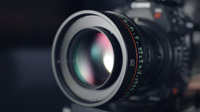 A close up of a camera lens caught from one of the best camera stores