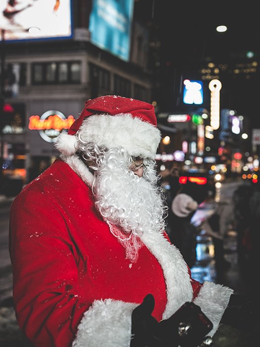 Christmas photo of Santa on a street