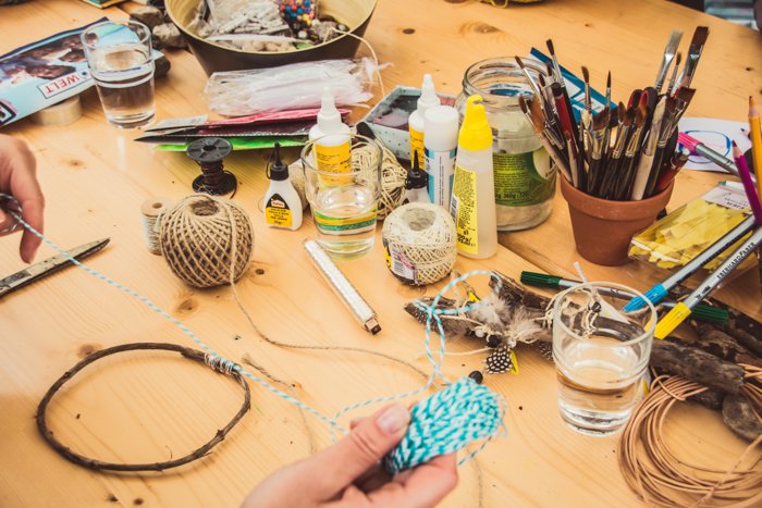 a table filled with DIY craft materials