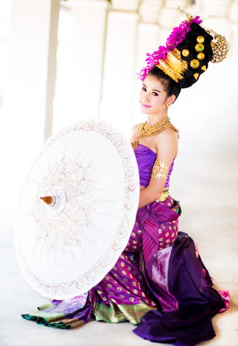 A high key portrait of a Thai girl in traditional clothing 