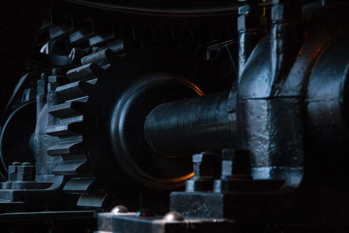 Close up shot of industrial machinery in low light