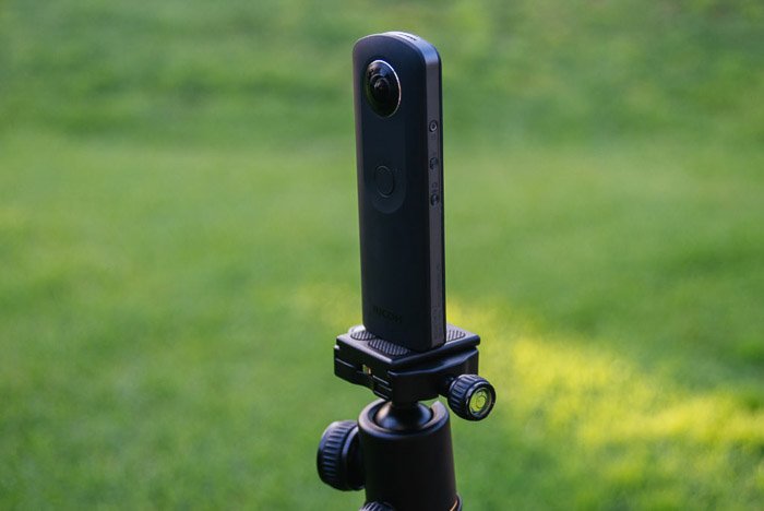 A 360 camera phone mounted on a tripod for taking sharper iPhone panoramas
