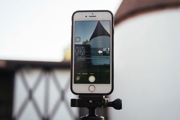 A phone mounted on a tripod for taking sharper iPhone panoramas