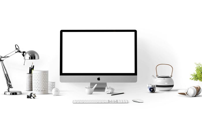 A pristine white office setup for photography marketing 