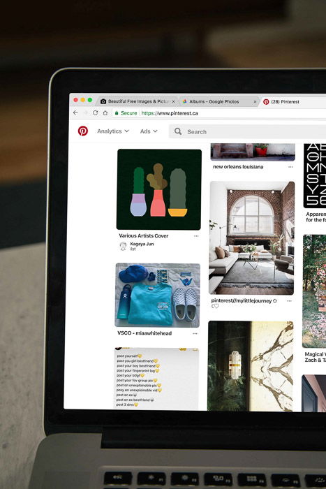 A laptop screen which is showing pinterest boards 