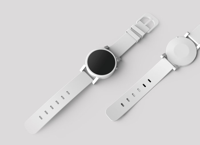 Watches with grey wristbands on a grey surface