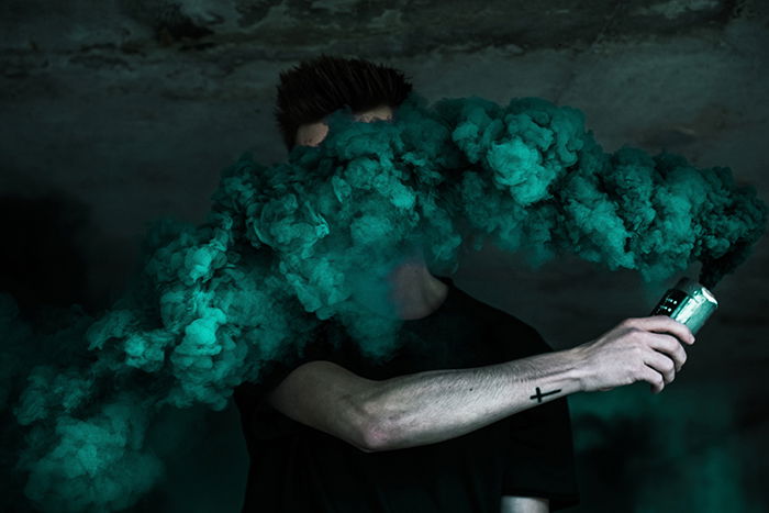 Smoke Bombs With Red Smoke Stock Photo - Download Image Now