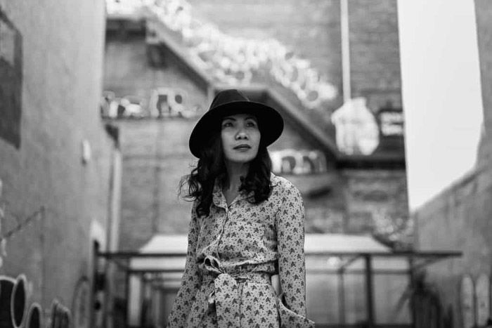 A black and white portrait of a woman in New York, NYC