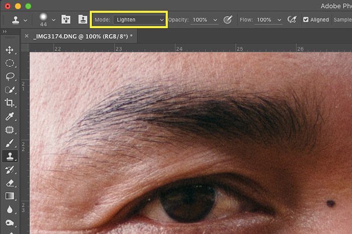 A screenshot of how to remove skin imperfections with Photoshop clone stamp tool - lighten