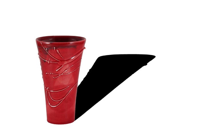 A product photography shot of a red vase with a strong shadow