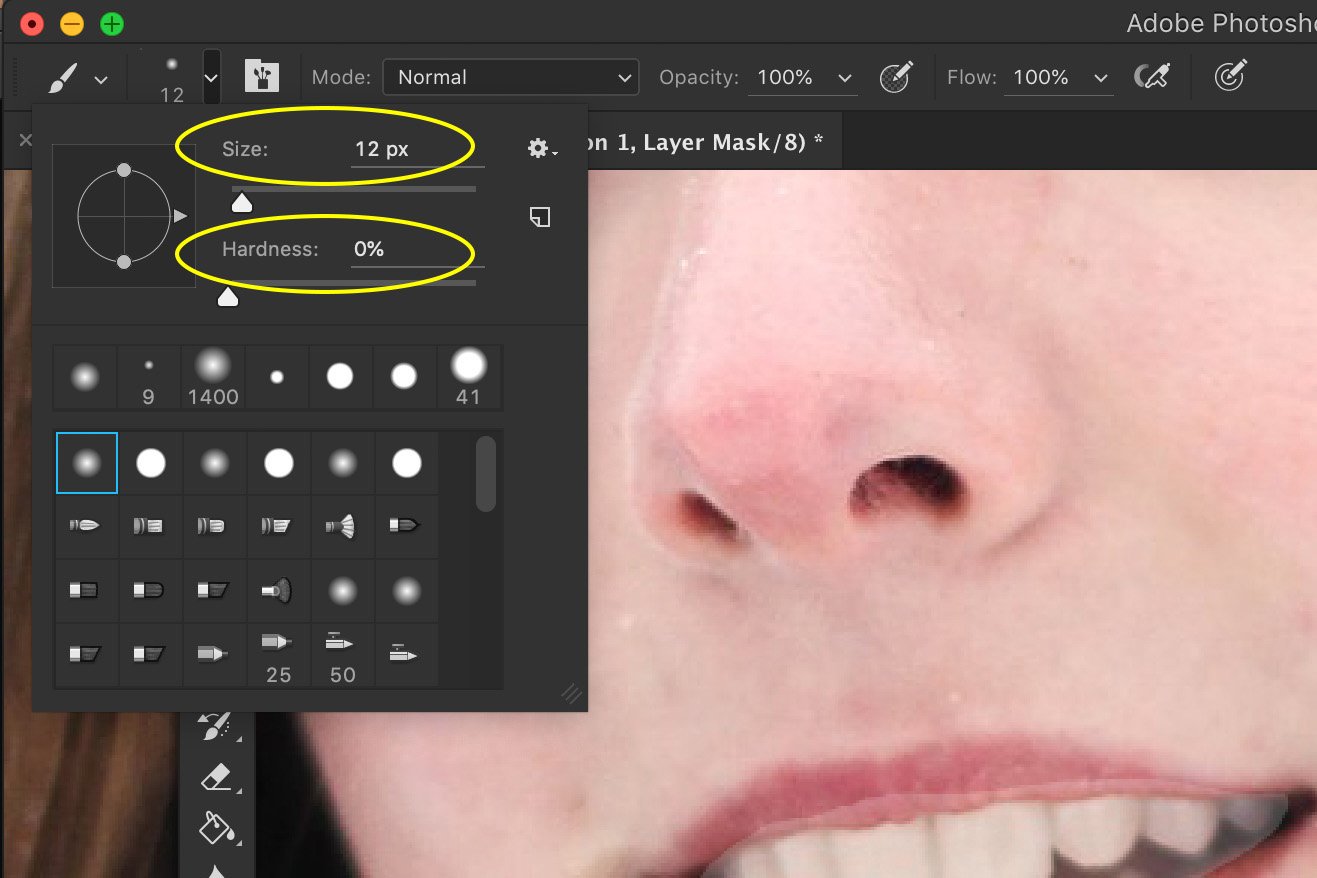 A screenshot of using brush tool to make teeth white photoshop