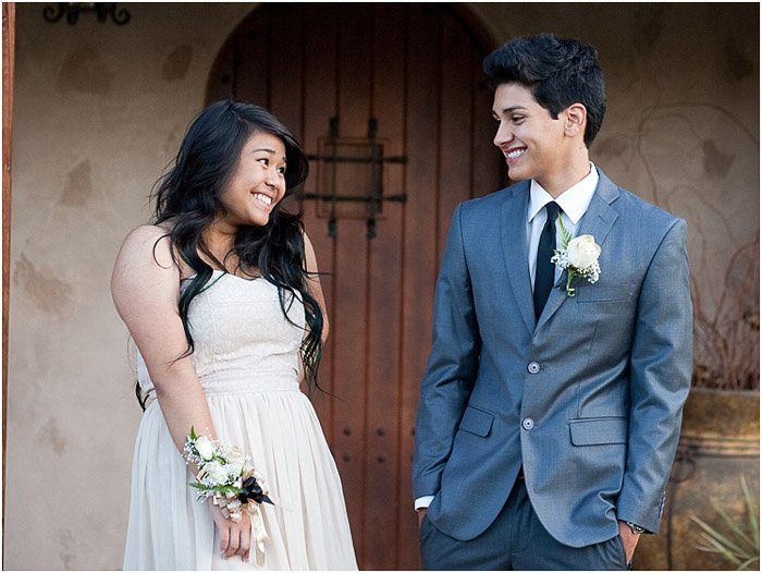 Cute prom photography of a teen couple posing outdoors, great prom picture ideas