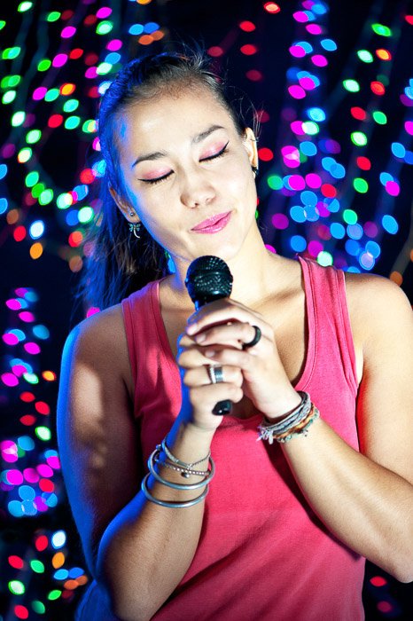 A portrait of a Pretty Asian Karaoke Singer