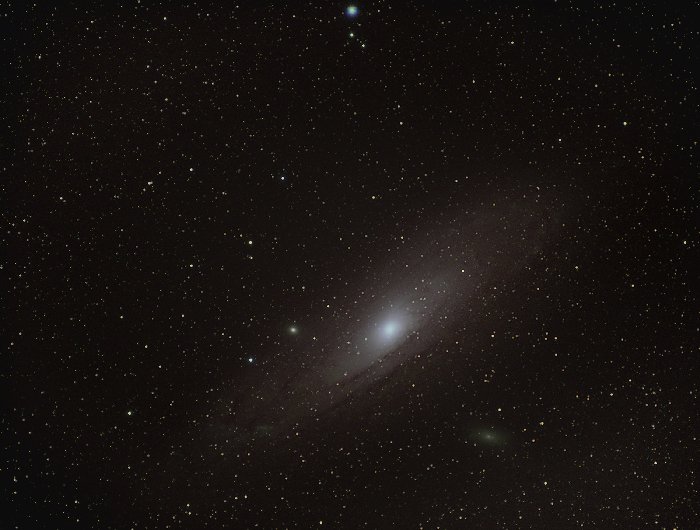 Andromeda in the night sky, flipped horizontally and vertically.