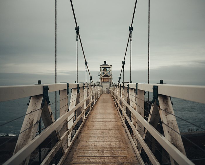 A photo of a wooden pier using symmetry in photography composition