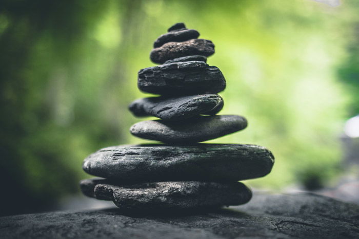 A pile of rocks outdoors, demonstrating unity in photography - principles of art and design